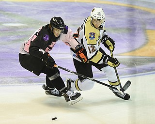 YOUNGSTOWN, OHIO - NOVEMBER 1, 2014: Kevin Conley #10 of the Phantoms and Cooper Marody #12 of Muskegon during the 1st period of Saturday nights game. (Photo by David Dermer/Youngstown Vindicator)