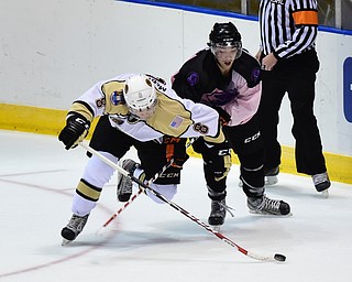 YOUNGSTOWN, OHIO - NOVEMBER 1, 2014: Bryan Lemos #13 of the Phantoms and Liam McGing #8 of Muskegon during the 1st period of Saturday nights game. (Photo by David Dermer/Youngstown Vindicator)