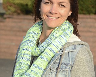 Katie Rickman | The Vindicator.Yvonne Wilson, the Director of Diversion and Safety at Struthers Middle School poses for a photo at the tailgate party at the middle school where the PANDA Leadership Club and the student volunteers interacted with middle school students on Wednesday, Oct. 29, 2014.