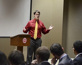 Katie Rickman | The Vindicator.Mark Stanford, the College Conservatives President debates College Democrat Tonoy Peterson regarding "Education Reform" during the political debate at YSU on Thursday, Oct. 30, 2014.