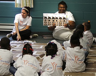  .          ROBERT  K. YOSAY | THE VINDICATOR.Listening intently with their PNC mat and PNC tea shirts - Jennifer Pyer and Sandy Clark read the story and vocabulary words..At the Mill Creek Childrens Center Preschoolers participated in the Guinness World Record attempt at largest vocabular lesson. ItÕs sponsored by PNC Bank...-30-
