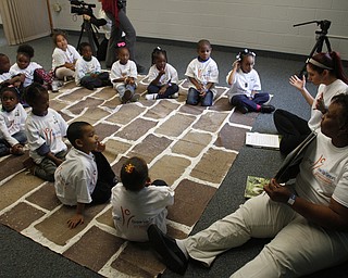  .          ROBERT  K. YOSAY | THE VINDICATOR.Listening intently with their PNC mat and PNC tea shirts - Jennifer Pyer and Sandy Clark read the story and vocabulary words..At the Mill Creek Childrens Center Preschoolers participated in the Guinness World Record attempt at largest vocabular lesson. ItÕs sponsored by PNC Bank...-30-