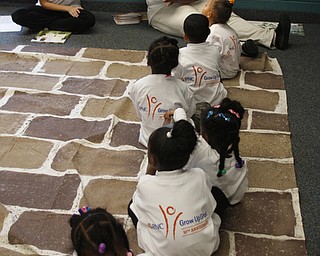  .          ROBERT  K. YOSAY | THE VINDICATOR.Listening intently with their PNC mat and PNC tea shirts - Jennifer Pyer and Sandy Clark read the story and vocabulary words..At the Mill Creek Childrens Center Preschoolers participated in the Guinness World Record attempt at largest vocabular lesson. ItÕs sponsored by PNC Bank...-30-