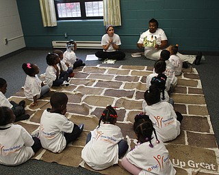  .          ROBERT  K. YOSAY | THE VINDICATOR.Listening intently with their PNC mat and PNC tea shirts - Jennifer Pyer and Sandy Clark read the story and vocabulary words..At the Mill Creek Childrens Center Preschoolers participated in the Guinness World Record attempt at largest vocabular lesson. ItÕs sponsored by PNC Bank...-30-