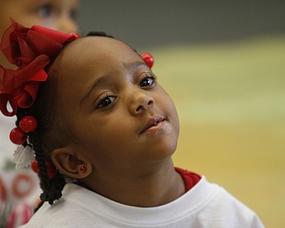  .          ROBERT  K. YOSAY | THE VINDICATOR..Jemyah Parker listens as  the story is read ....At the Mill Creek Childrens Center Preschoolers participated in the Guinness World Record attempt at largest vocabular lesson. ItÕs sponsored by PNC Bank...-30-