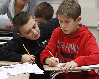  .          ROBERT  K. YOSAY | THE VINDICATOR..Al De'Angelo and Dan Blasko both 5th graders go over a math problem -.Polands McKinleyÕs math club meets. before school and is  thriving math enrichment programs, with the help of volunteers and staff....-30-