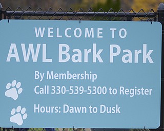 Katie Rickman | The Vindicator .The sign on the entrance of the Bark Park at Trumbull County Animal Welfare League where members can bring their dogs to the park to play.