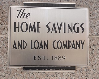 Katie Rickman | The Vindicator.The plaque at the entry way of The Home Savings and Loan Company on Friday, Oct. 31, 2014. The bank is has been in business for 125 years.