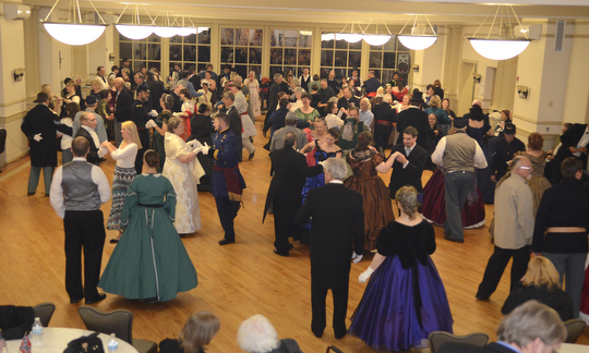 Katie Rickman | The Vindicator.The ballroom floor filled with dancers dressed in Civil War period dress for The Governor David Tod Civil War Ball at the Tyler History Center in Youngstown on Saturday, Nov. 1, 2014.