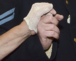 Katie Rickman | The Vindicator.A couple dressed in Civil War period clothing clasp hands during a waltz at The Governor David Tod Civil War Ball at the Tyler History Center in Youngstown on Saturday, Nov. 1, 2014.