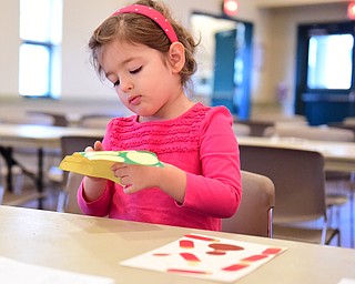 CANFIELD, OHIO - NOVEMBER 1, 2014: Kate Walko 3, of Poland does arts and crafts Saturday morning during the Farm Harvest Fun Fest. (Photo by David Dermer/Youngstown Vindicator)
