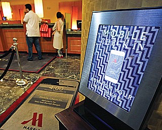 A mobile check-in option is offered for travelers at the main check in counter at the Marriott Marquis Times Square hotel in New York. Marriott International launched the ability to check in through its app at 330 North American hotels last year. By the end of this year, the program will be live at all 4,000 hotels worldwide.