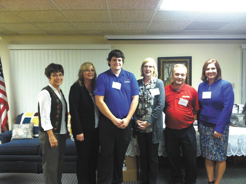 SPECIAL TO THE VINDICATOR The Columbiana Chamber of Commerce presented its Fall Business Showcase on Oct. 23 at Harmony Village, which welcomed guests and provided an array of fall foods. The chamber plans quarterly showcases to encourage networking and education among local business people and the community. From left to right are Chery Luli, Harmony Village; Deb Salmen, Crown Theater Productions; Bronson Lamoncha, Humtown Products; Kayte Targove, Savvy Chic; Ralph Cassidy, Advance Auto Parts; and Leah Wilson, 2014 chamber president.
