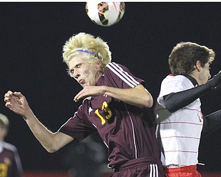 William D Lewis The Vindicator  SR's Jonah Wilson (13) and Mansfields Brandon Mount(14) durining playoff action in Wadsworth 11-5-14.