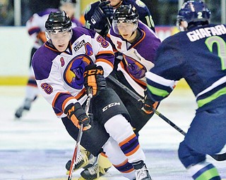 Jeff Lange | The Vindicator  Phantoms' Josh Melnick (8) cuts around the defense of Bloomington's Butrus Ghafari (right) toward the Thunders' goal, Wednesday morning at the Covelli.