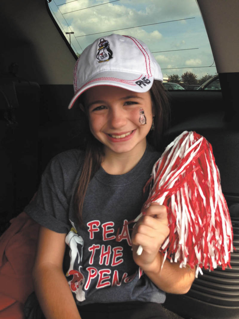 Bree Latell, 9, from Boardman, cheering on the YSU Penguins. Submitted by her mom, Jen Latell.