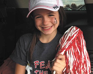 Bree Latell, 9, from Boardman, cheering on the YSU Penguins. Submitted by her mom, Jen Latell.