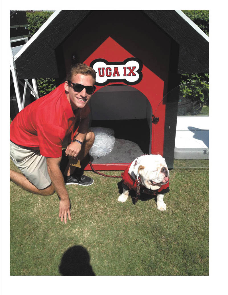 Gene Wollet, now attending grad school in Athens, Ga., played basketball for Canfield and graduated from YSU, is shown with UGA, voted number one mascot. Submitted by Greg Main.