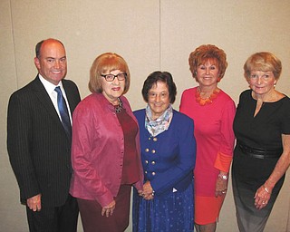 SPECIAL TO THE VINDICATOR The fall meeting of the Catholic Collegiate Association took place Oct. 1 at the Holiday Inn in Boardman. New members, Christine Berlin and Sister Charlotte Italiano, OSU, were welcomed. The speaker was Youngstown Mayor John A. McNally, discussing the progress of Youngstown and its downtown revitalization. Above, from left to right, are Mayor McNally, Barbara Banks, vice president of Catholic Collegiate; Sister Charlotte; Cathy Campana, president of Catholic Collegiate; and Jeanne McNally.