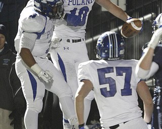  .          ROBERT  K. YOSAY | THE VINDICATOR..Celebrate as #10 Poland Tate Duarte caught a pass with just seconds to go in the first half celebrates with #3 Marlon Ramirez  and #57  Mike Carney..Poland Bulldogs vs Louisville Leopard at Louisville....-30-
