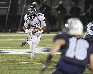  .          ROBERT  K. YOSAY | THE VINDICATOR..Polands #3 Marlon Ramirez looks for a whole as he romps for a first down during first quarter action..Poland Bulldogs vs Louisville Leopard at Louisville....-30-