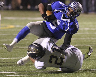 William D. Lewis the vindicator  Hubbards Cam  Ingram (5) isstopped by Tallmadge's Nate Adolph(21) during 11-7-14 game.