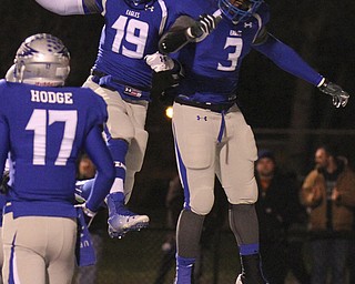 William D. Lewis the vindicator  Hubbards Larry Scott(3) celebrates with Isiah Scott (19) after Larry scored 1rst TD of 11-7-14 game against Tallmadge.