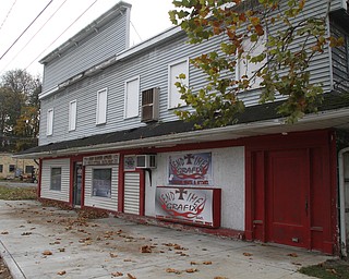        ROBERT K. YOSAY  | THE VINDICATOR..Vito Conniglio and his father-in-law have been working to remodel End Time Grafix, a graphics business in downtown Struthers. Conniglio and his father-in-law bought the building about a year ago. According to Conniglio, itÕs been almost not safe to do business in the building because of the buildingÕs deteriorating second floor. .-30-
