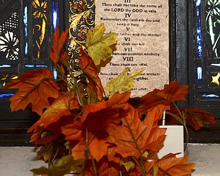 Katie Rickman | The Vindicator..Vickie Kelley and her husband Ken are both preachers at local Methodist churches, they maintain a relevant, vibrant church style. Seen here are Ten Commandments spruced up with fall leaves on Tuesday, Nov. 4, 2014.