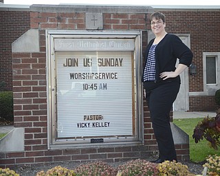 Katie Rickman | The Vindicator.Rev. Vickie Kelley stands outside of Girard First United Methodist where she is the current pastor on Tuesday, Nov. 4, 2014. Her husband, Ken Kelley preaches at a church in Liberty.