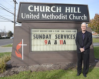 Katie Rickman | The Vindicator.Rev. Ken Kelley stands outside of Church Hill United Methodist where he is the current pastor on Tuesday, Nov. 4, 2014. His wife, Vickie Kelley preaches at a church in Girard.