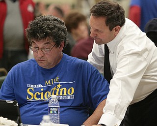        ROBERT K. YOSAY  | THE VINDICATOR..Mike Sciortino     gets close to the end as campaign worker  Jim Bertrando..   pulls up results on his eye phone