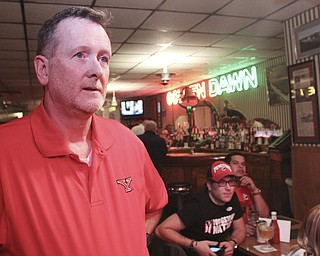 William D. Lewis the Vindicator  Chris Travers, treasurer of the Committee for Responsible Redistricting watches election results Tuesday at the Golden Dawn in Youngstown.