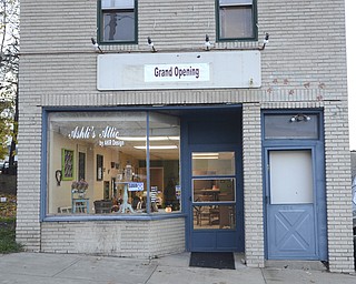 Katie Rickman | The Vindicator.The storefron of Ashli's Attic in Struthers on Wednesday Nov 5, 2014 where store owners Ashli Zinkhon and Adam Ruess recently started their crafting store where they sell refinished furniture and crafts.
