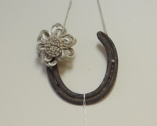 Katie Rickman | The Vindicator.Ashli Zinkhon and Adam Ruess recently moved there crafting business into an abandoned building in Struthers, they sell home made and refurbished home decor.