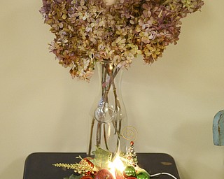 Katie Rickman | The Vindicator.Ashli Zinkhon and Adam Ruess recently moved there crafting business into an abandoned building in Struthers, they sell home made and refurbished home decor.