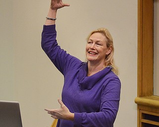 Katie Rickman | The Vindicator.Christina Grant, performing artist speaks to a group of local artists and students at McDonough Museum of Art for a Power of the Arts panel discussion on Wednesday, Nov. 5, 2014.