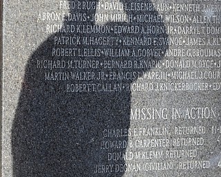 Jeff Lange | The Vindicator  A veteran of Mahoning County salutes the memorial as he pays his respect to those who have fallen, Sunday afternoon during the Reading of Names in Youngstown.
