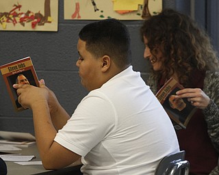        ROBERT K. YOSAY  | THE VINDICATOR..Discovery at Volney 3- 8th grade - ..Nathaniel Munoz 4th grade in a discussion on the Steve Jobs book  with his teacher Sherri Bennett .-30-.
