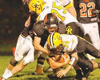 Crestview running back Zach Hicks (34) dives for the end zone as Springfield’s Ian Grdina (1) tries to stop him during their Week 8 game in New Middletown. Saturday, Crestview will play top-seeded Canton Central Catholic in Minerva.