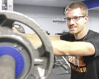 William D. Lewis the Vindicator Mudder Chad Macek trains at Kettlebell fitness in niles.