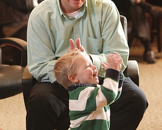        ROBERT K. YOSAY  | THE VINDICATOR..Trumbull County Court annual Adoption Day...Celebrate as Johnathan Meyer  claps with his dad Rodd..