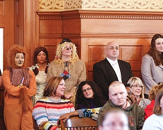        ROBERT K. YOSAY  | THE VINDICATOR..Trumbull County Court annual Adoption Day...in the crowd to make the children feel welcomed were wizard of oz characters Patty Fonce Kim Flynn and ali Fonce all from Niles of Salon La'sej