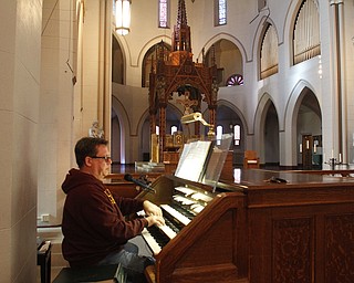        ROBERT K. YOSAY  | THE VINDICATOR..Kris Harper plays the new organ...St. Patrick Church Youngsotwn .. has installed organ from former John Knox Church. dedication will be Nov. 23..