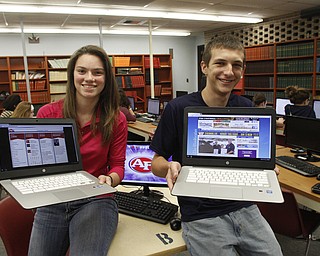        ROBERT K. YOSAY  | THE VINDICATOR..Austintown  Fitch Students willbe getting HP Chromebooks soon as part of a schoolwide program ...   p EvaEnid  (this is correct EvaEnid)  Rivera a freshman and Tyler Vinkler hold two of the 1200  hp  chrome books ...