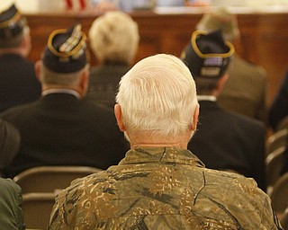        ROBERT K. YOSAY  | THE VINDICATOR...Veterans Day observance - a veteran wears the MIA..patch to bring them home at the Veterans Day Service.at Mahoning County Courthouse.