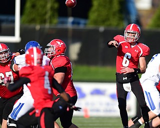 YOUNGSTOWN, OHIO - NOVEMBER 15, 2014: Hunter Wells #6 of YSU throws a pass from the pocket during the 1st half of Saturday afternoons game at Stambaugh Stadium. (Photo by David Dermer/Youngstown Vindicator)