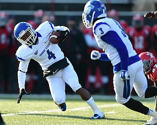 YOUNGSTOWN, OHIO - NOVEMBER 15, 2014: Gary Owens #4 of Indiana state tuns upfield for extra yardage after a reception during the 1st half of Saturday afternoons game at Stambaugh Stadium. (Photo by David Dermer/Youngstown Vindicator)