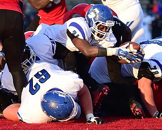 YOUNGSTOWN, OHIO - NOVEMBER 15, 2014: Dimitri Taylor #31 of Indiana State reaches the ball out across the goal line to score a touchdown during the 2nd half of Saturday afternoons game at Stambaugh Stadium. (Photo by David Dermer/Youngstown Vindicator)