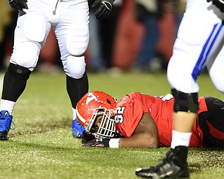 YOUNGSTOWN, OHIO - NOVEMBER 15, 2014: Octavius Brown #92 of YSU lays not he ground after the game winning field goal by Indiana State in overtime of Saturday afternoons game at Stambaugh Stadium. (Photo by David Dermer/Youngstown Vindicator)